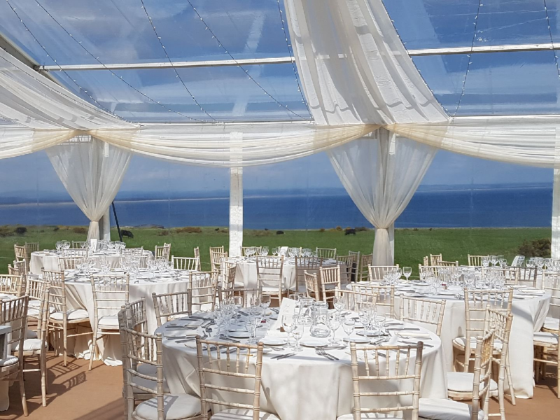 clear roof on a marquee overlooking the sea